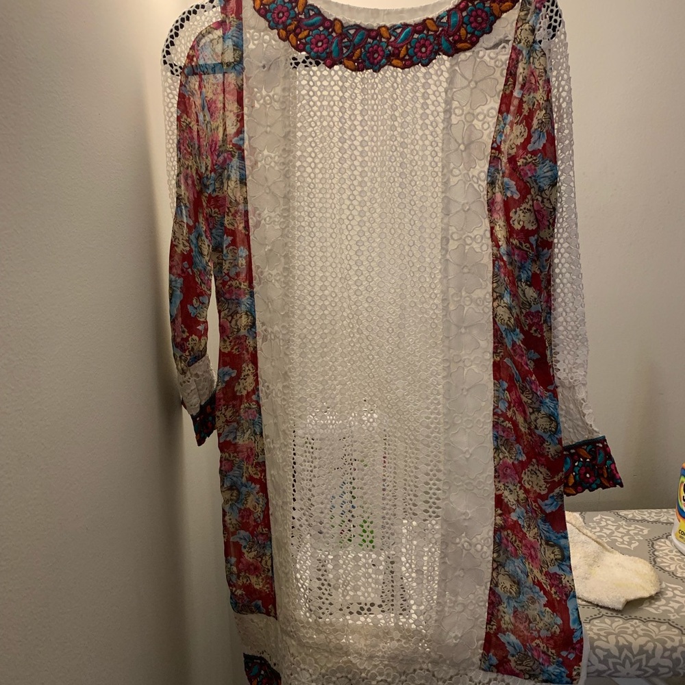 White thread and motif